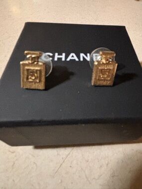 This is an authentic CHANEL Coco No 5 Perfume Bottle Earrings in Gold.